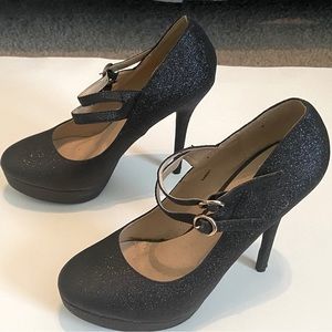 5 inch platform black sparkly heels. Barely worn.